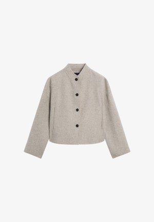 Szara wełniana kurtka o skróconym fasonie, z kołnierzykiem mandaryńskim i pięcioma czarnymi guzikami z przodu. Posiada oversize'owe rękawy i boczne kieszenie.