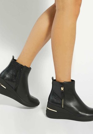 Bottines compensées - black