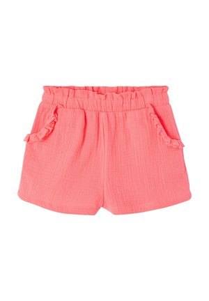 Coral pink toddler shorts with elastic ruffled waistband and two front pockets featuring ruffle trim, textured lightweight fabric.