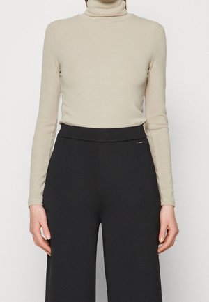 Långärmad tröja - beige