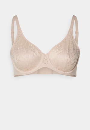 Lace-trimmed bra in light beige, featuring a smooth fabric, molded cups, adjustable straps, and a hook-and-eye back closure.