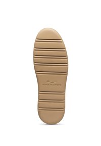 Tan rubber shoe sole with horizontal grooves and a rounded toe. Features "VOILE BLANCHE" logo near the heel. Smooth texture overall.