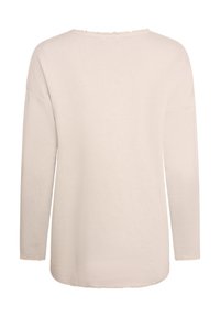 Top lungo beige chiaro a maniche lunghe realizzato in tessuto testurizzato, con scollatura ampia e orlo sfrangiato, dalla silhouette dritta.