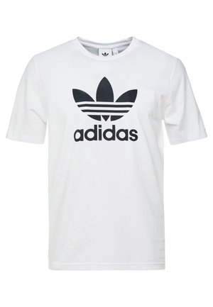 Wit T-shirt met korte mouwen en groot zwart Adidas trefoil-logo en tekst gecentreerd aan de voorkant.