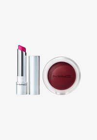 Pink lipstick with a metallic silver casing next to a round, smooth blush in a clear container, featuring a deep red shade and embossed logo.