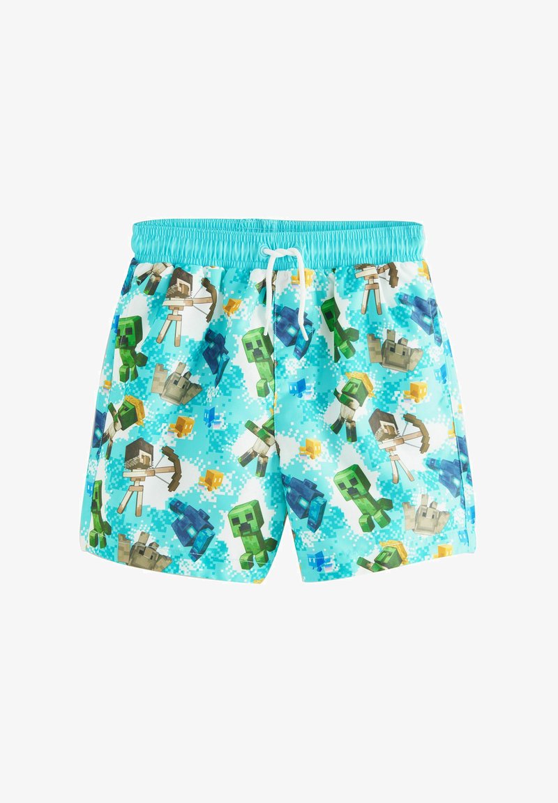 Short de bain bleu avec des personnages de Minecraft, notamment des creepers, des squelettes et des loups sur un fond bleu clair pixelisé.