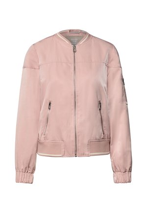 Manteau bomber rose clair avec fermeture éclair à l'avant, deux poches latérales zippées, poignets et ourlet côtelés avec accents de rayures blanches.