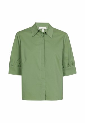 Kurzärmliges, hellgrünes Hemd aus glattem Stoff. Mit spitzem Kragen, Knopfleiste und dezenten Steppnähten an den Ärmeln.
