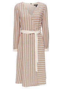 Robe portefeuille à manches longues avec motif circulaire pêche et blanc, col en V, poignets blancs et ceinture nouée blanche assortie à la taille.
