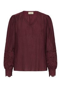 Burgunderbluse med lange puffærmer, der har intrikate blomsterlacemønstre og en V-halsudskæring. Fremstillet af letvægts, tekstureret stof.