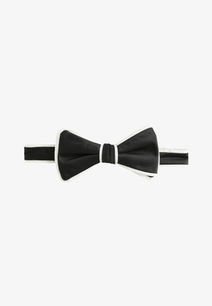 Black bow tie with vertical ribbed texture, featuring a white satin trim and center knot. Adjustable band for a secure fit.