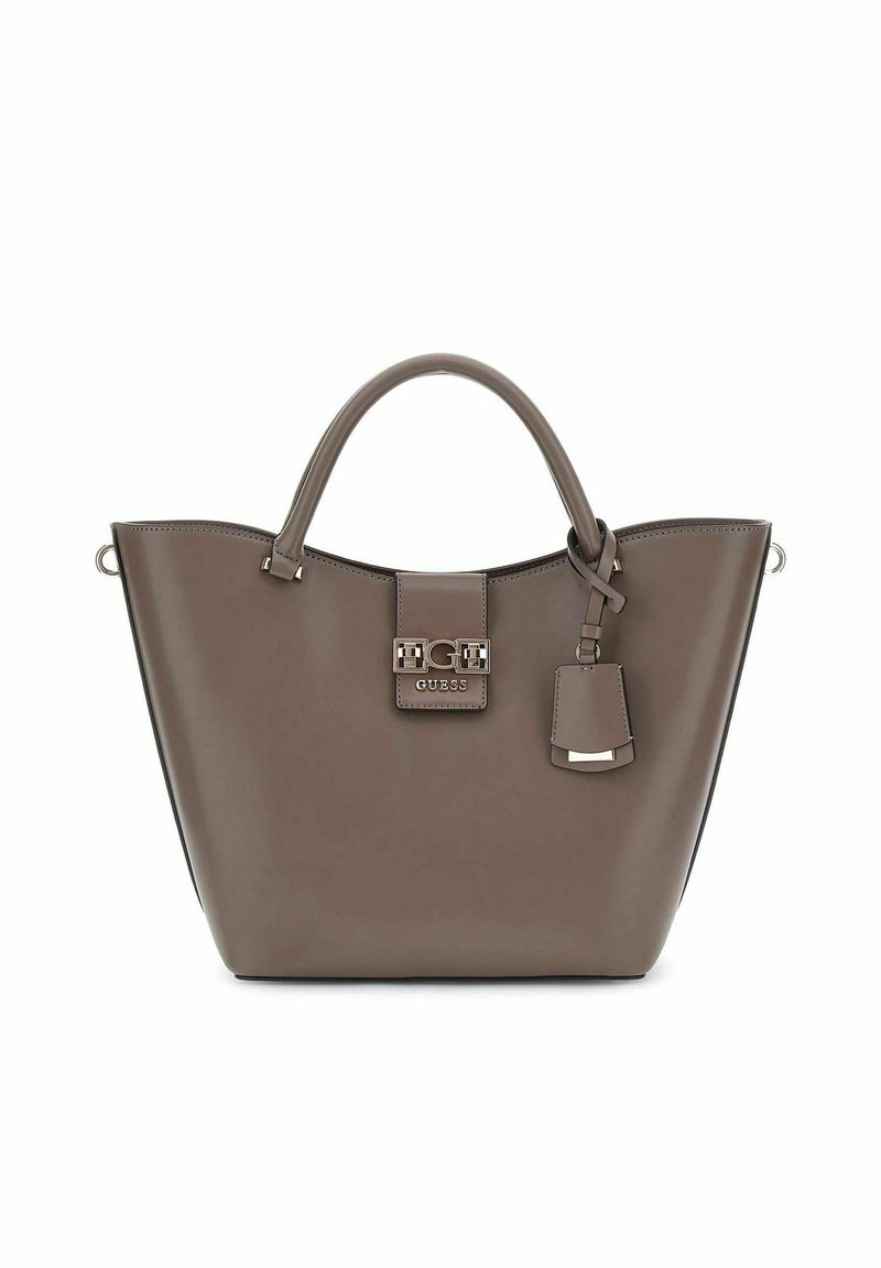 Sac fourre-tout en simili cuir marron avec deux poignées, forme structurée, matériel logo sur le rabat avant et une étiquette amovible.