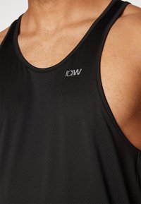 ICANIWILL STRIDE STRINGER MEN - Felső - black