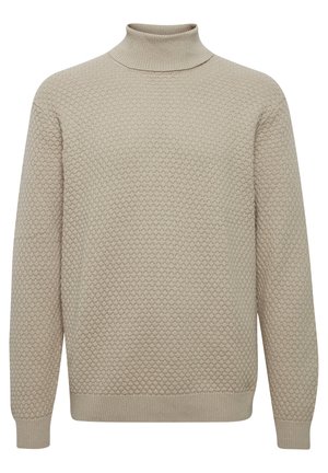 Beige turtleneck-sweater med et struktureret honningkagesmønster, lange ærmer og ribbet kant og krave. Lavet af let strikket stof.