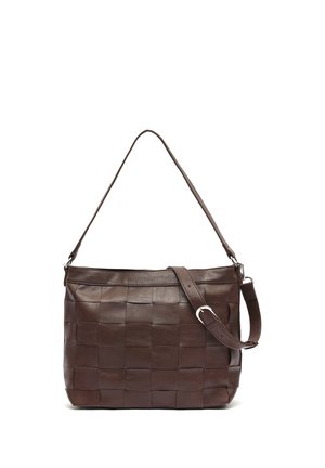 Brown leather handbag with woven square pattern, featuring a single top strap and an adjustable buckle strap on a white background.