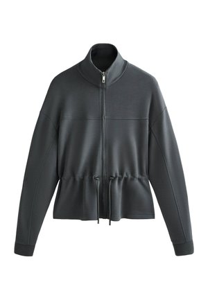 Donkergrijs jack met rits en hoge kraag, een taille met trekkoord en geribbelde manchetten. Glad materiaal met een minimalistisch ontwerp zonder zichtbare patronen.