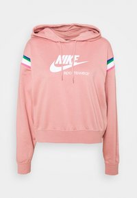 Pink Nike hoodie featuring a front pocket, drawstring hood, and white logo with colorful stripes on the sleeves. Made from soft, textured fabric.