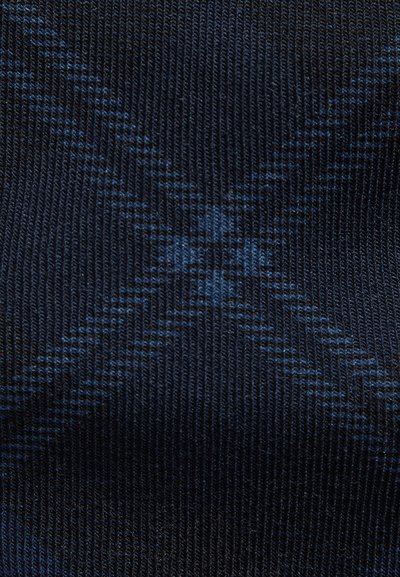 Tela de punto azul marino con una textura suave que presenta un sutil patrón de cuadros en azul más claro, resaltado por líneas diagonales en toda la superficie.