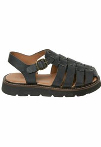 Black leather sandal with woven upper, adjustable buckle strap, and thick sole. Features a textured finish and open back design.