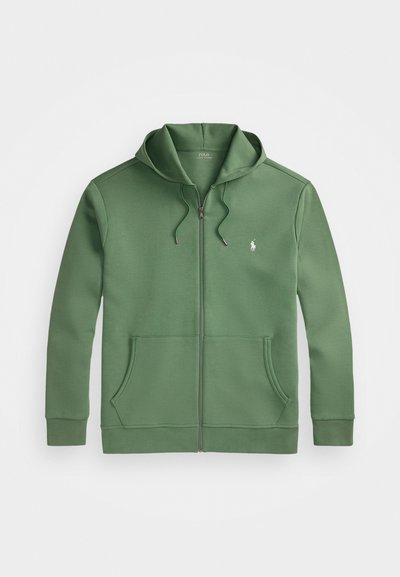 Grön zip-up hoodie i slätt tyg med en framfickor, justerbar dragkedja och huva samt framfickor. Litet logotyp på bröstet.