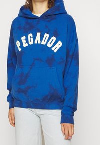 Pegador Jersey con capucha - blue