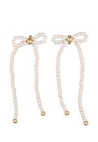 Accessoires capillaires en perles avec des perles blanches, un centre en boule dorée et un design en nœud avec deux mèches pendantes. Texture lisse avec des accents métalliques.
