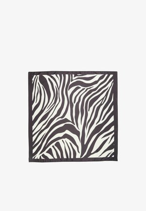 Kvadratisk stof med fedt sort og hvidt zebrastribet mønster og en solid sort kant.