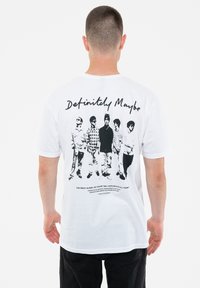 White cotton t-shirt featuring a black graphic of five figures on the back with the text “Definitely Maybe” above and album details below.