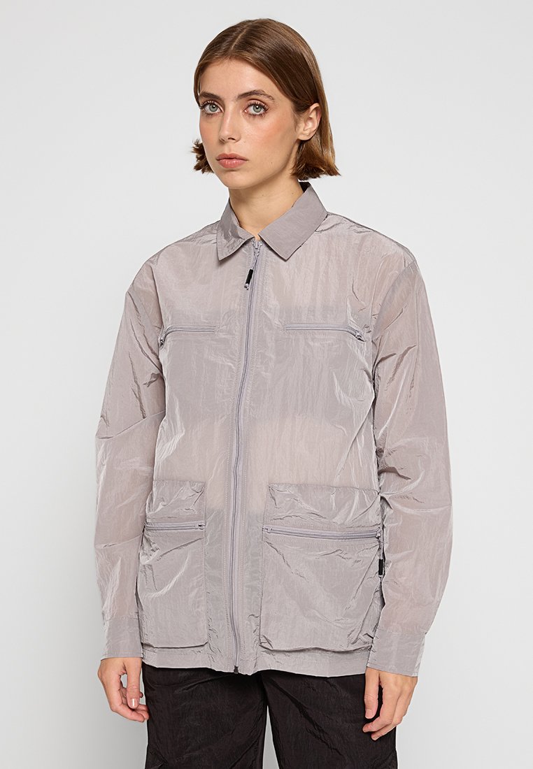 Rains Lichte jas taupe Rains Lichte jas taupe