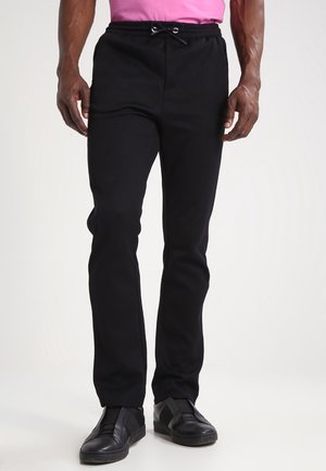 Pantalones deportivos - black