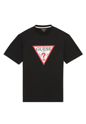T-shirt en coton noir avec un graphique triangulaire rouge et blanc affichant "GUESS" et un point d'interrogation, manches courtes et col rond.