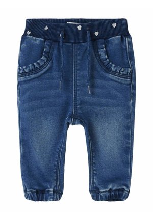 Pantaloni jogger in denim con vita elasticizzata, dotati di cordino, tasche arricciate e piccoli dettagli a forma di cuore. Colore blu scuro con leggera scoloritura.