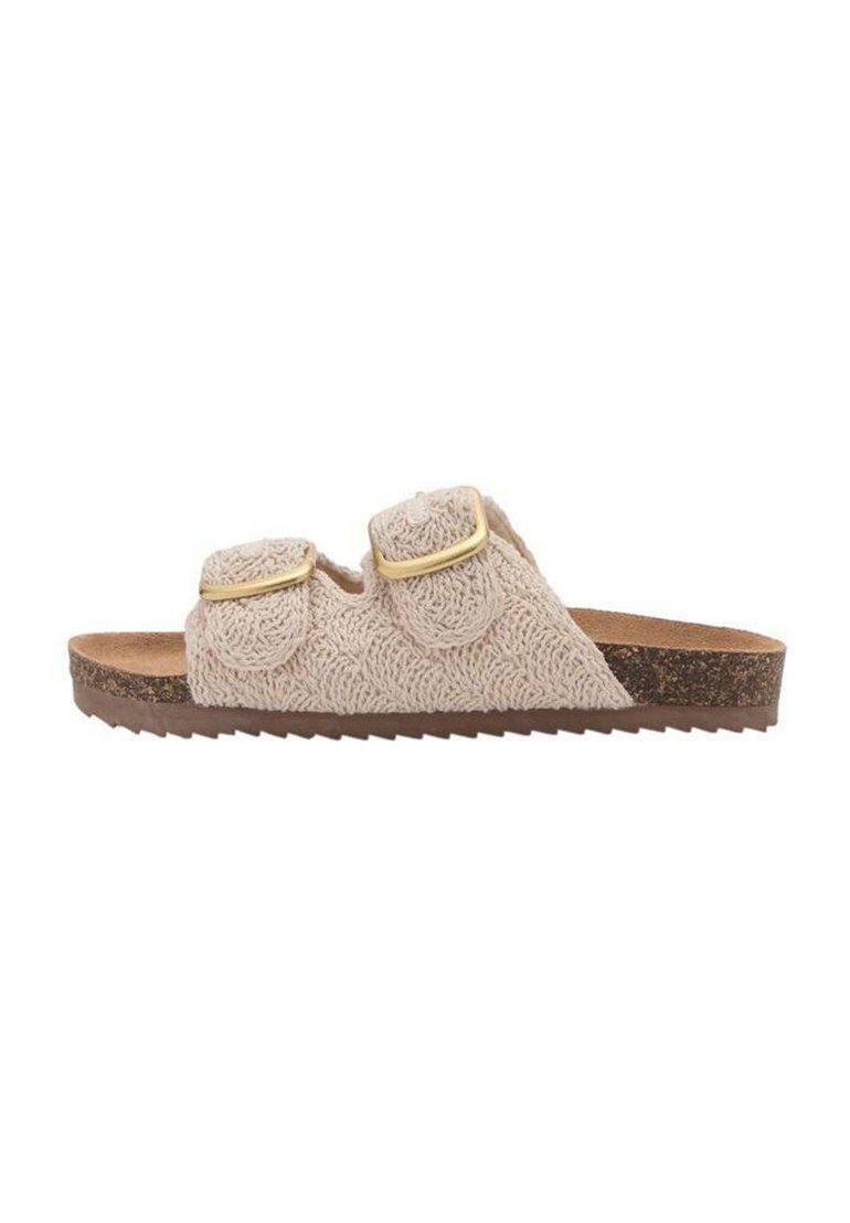 Sandale slide beige avec deux sangles réglables, dessus en tissu texturé, semelle en liège et semelle externe striée pour une meilleure traction.