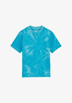 T-shirt a maniche corte turchese in cotone, con un motivo di foglie di palma su tutta la superficie. Collo rotondo e vestibilità comoda.