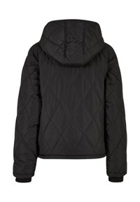 Schwarze gesteppte Jacke mit Kapuze, diagonaler Rautensteppung, elastischen Bündchen und lockerem Schnitt.