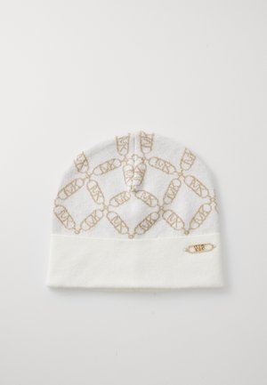 Bonnet en tricot blanc avec motif doré. Présente une texture douce, un revers replié et un accent en forme de pin doré.