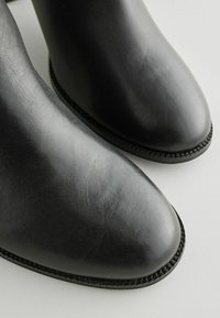 Enkelkaarsjes - mottled black