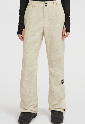 Beige sneeuwbroeken met een abstract textuurpatroon, twee knopen op de tailleband en een zwart logolabel nabij de zoom. Aansluitend bij de enkels.
