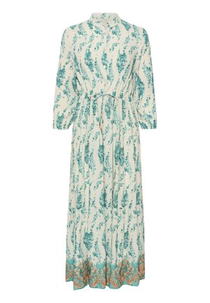 Robe longue et légère avec un motif floral en bleu sarcelle et blanc. Elle a un col haut, des manches longues et un ourlet décoratif doré.