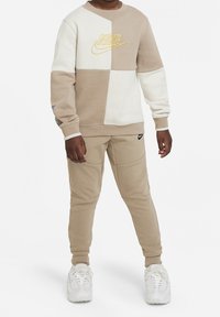 Nike Sportswear Träningsbyxor - khaki/yellow ochre/(black)