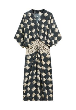 Robe longue à carreaux noirs et beiges avec des manches larges et un détail froncé et à motifs à la taille.