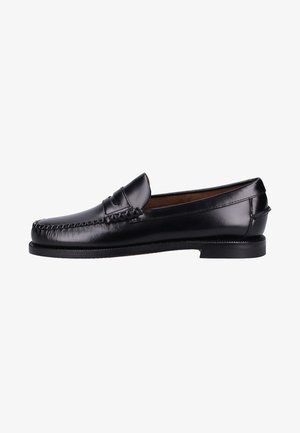 Black leather loafers featuring a smooth finish, rounded toe, decorative stitching, and a low heel. The design is minimalist with no visible hardware.