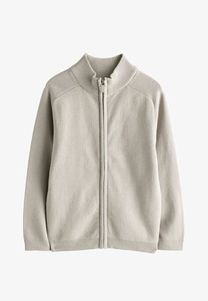 Světle šedý zipový svetr s vysokým límcem, žebrovanými manžetami a hladkým pleteným povrchem. Obsahuje přední zip a bezšvové ramena.