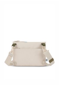 Borsa a tracolla beige realizzata in tessuto durevole, con cinturini regolabili verde oliva, chiusura con zip e una tasca frontale.