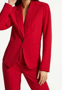 Next Bleiseri - red