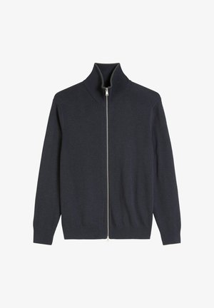 Sweat à zip noir marine avec un col haut, fabriqué en tissu doux. Présente une fermeture éclair élégante et des poignets côtelés pour plus de texture.