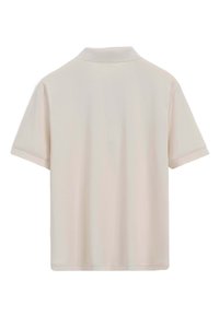 Polo à manches courtes de couleur beige clair avec une texture douce et lisse. Il possède un col classique et un ourlet droit sans logos ni motifs visibles.