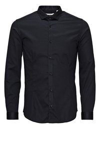 Chemise noire à manches longues, boutonnée sur le devant, avec col pointu et poignets boutonnés, présentée de face sur un fond blanc.