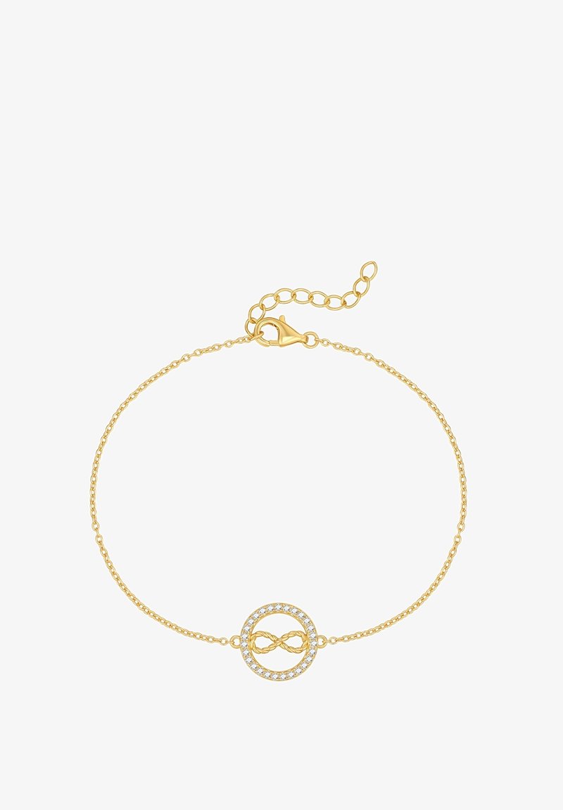 Zelta ķēdīte ar bezgalības simbola centru, kuram apkārt ir mazi caurspīdīgi kristāli, nodrošināta ar omā vāciņiem un regulējamu ķēdi.