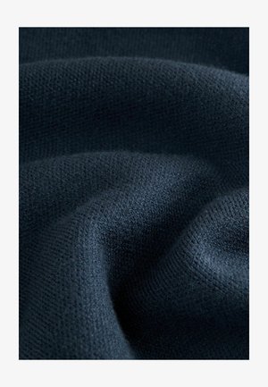 Marineblau gestrickter Stoff mit einer strukturierten Webart, der weiche, glatte Konturen und einen subtilen Glanz aufweist. Ideal für Bekleidung oder Accessoires.